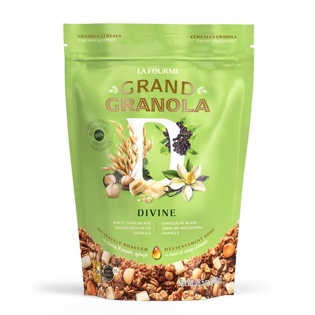 La Fourmi Grand Granola Divine in an 808g resealable green pouch. The packaging highlights its organic ingredients, including white chocolate, macadamia nuts, vanilla, and elderberry dust. The granola is delicately roasted with Canadian wildflower honey and organic maple syrup. Certified organic, kosher dairy, non-GMO, and made in Canada with over 78% locally sourced ingredients. Ideal for breakfast with milk or yogurt, as a topping, or as a snack.