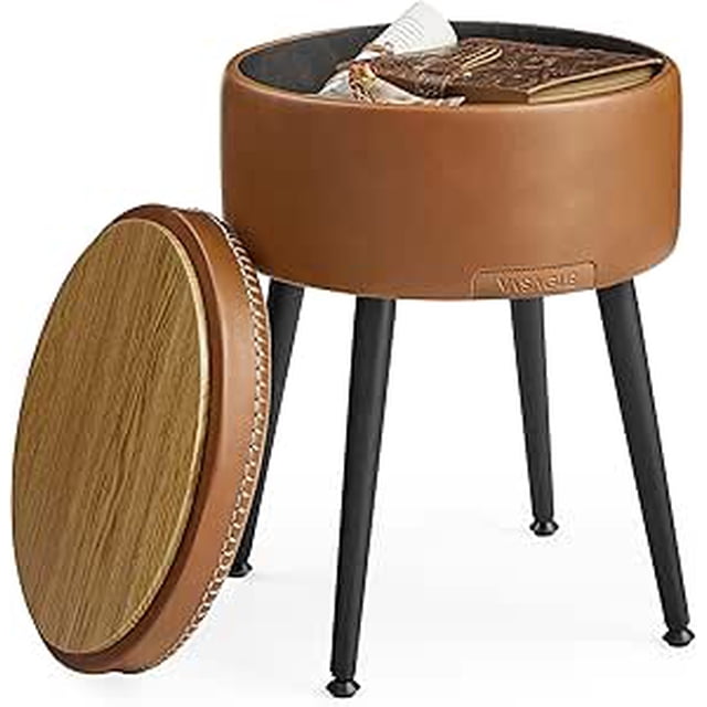 VASAGLE EKHO Collection Storage Ottoman in caramel brown, designed for living room furniture. Features a round PU leather seat with a removable lid revealing a 2.5-gallon storage compartment. Supported by sturdy steel legs and high-resilience foam for comfort and durability. Ideal as a vanity stool, footrest, or modern side table.