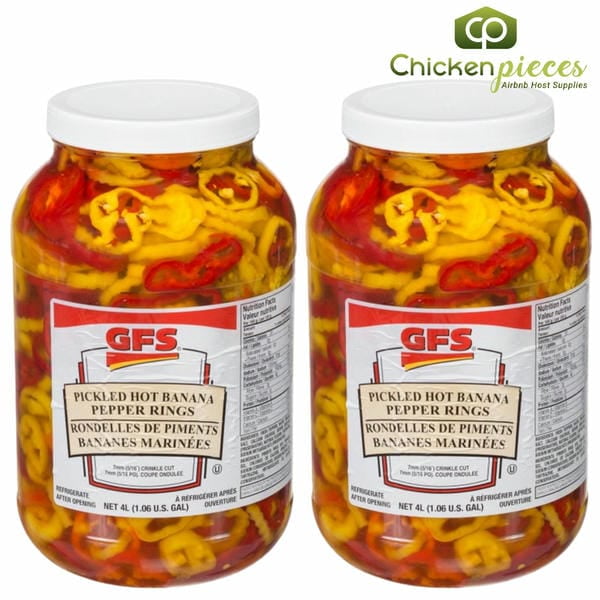 Gordon Choice Sliced Hot Banana Pepper Rings in a 1.06-gallon (4L) jug, featuring vibrant yellow and red pepper rings pickled in brine. The peppers are pre-sliced to a uniform 5/16-inch thickness, ideal for use as a gourmet topping on pizzas, subs, salads, and burgers. The image shows two large, clear jugs with white lids and GFS branding, designed for high-volume foodservice and catering.