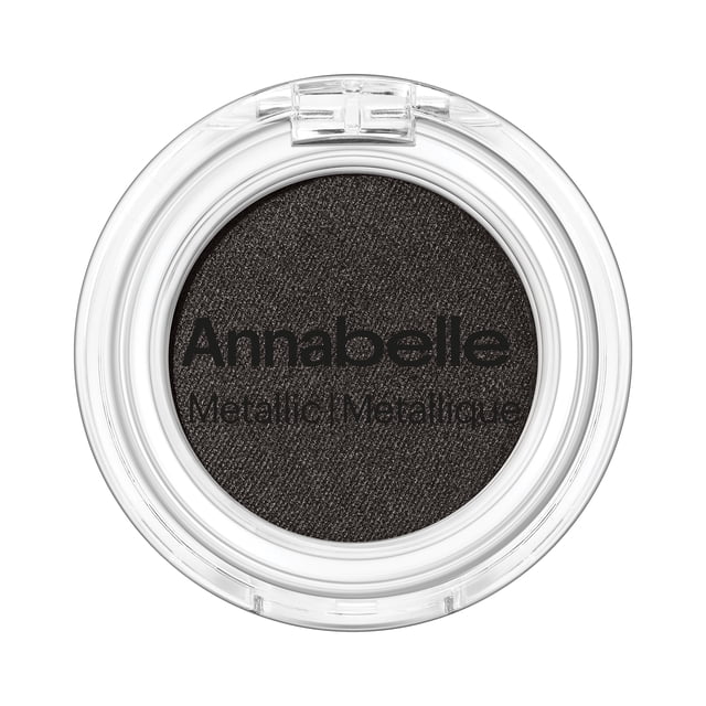 Annabelle Metallic Single Eyeshadow in Onyx, a dark metallic black powder eyeshadow in a round clear compact with a transparent lid, featuring a soft velvety texture and highly pigmented, long-lasting formula ideal for crease-free wear and smooth blending.