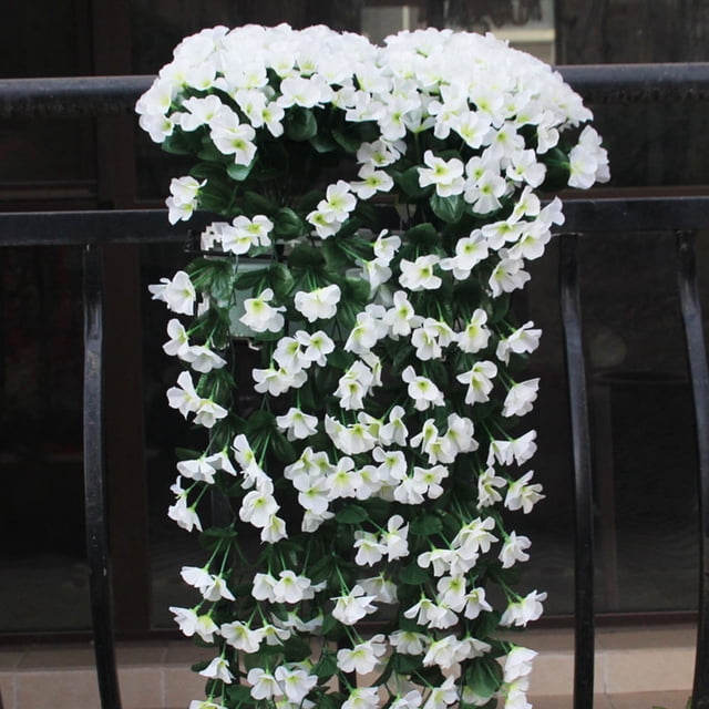 LSLJS Artificial Flowers Fashion Household Violet Wall Hanging Violet Artificial Flower Decoration Simulation Wall. A cascading arrangement of white artificial violet flowers with green leaves, designed to hang gracefully from a railing or wall. Made of silk cloth and plastic, these reusable flowers feature soft petals and a natural appearance. Suitable for home décor, weddings, or events, and easy to install on walls, doors, or other surfaces.