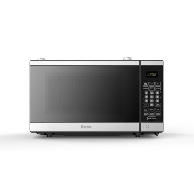Danby Designer DDMW007501G1 0.7 cu ft countertop microwave in stainless steel with a front-facing dark glass door and digital control panel featuring six auto cook options, numeric keypad, and digital display, ideal for space-saving countertop or under-cabinet use in apartments or small kitchens.