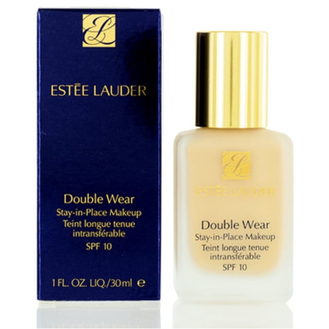 Estee Lauder Double Wear Stay in Place Makeup in 1W2 Sand, 1-ounce bottle. A liquid foundation designed to stay fresh and flawless through heat, humidity, and nonstop activity. The product is shown in a frosted glass bottle with a gold cap, next to its navy blue packaging with gold lettering.