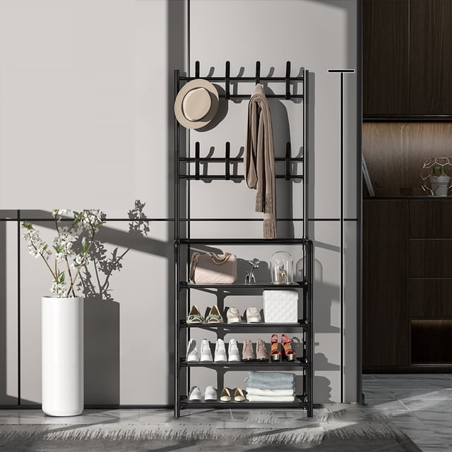 Clothes Hanging Rack Organizer Standard Clothing Rack Standing Coat Rack made of metal with a modern design. Includes double-layer metal hooks for hanging garments, a multi-layer shoe rack for storing shoes, bags, and other items, and waterproof interlayer cloth for durability. Ideal as a closet organizer or space-saving storage solution. Displayed in a contemporary room setting with sunlight and decorative items.