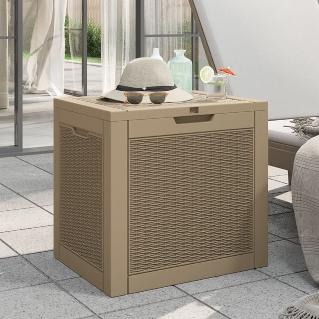 vidaXL Garden Storage Box in light brown, measuring 55.5x43x53 cm, made of durable polypropylene with a 118 L capacity. Features an imitation rattan design, lockable lid, ergonomic side handles, and a practical top for use as a tabletop. Ideal for storing garden tools, patio cushions, or pool toys. Shown in an outdoor patio setting with decorative items on top.