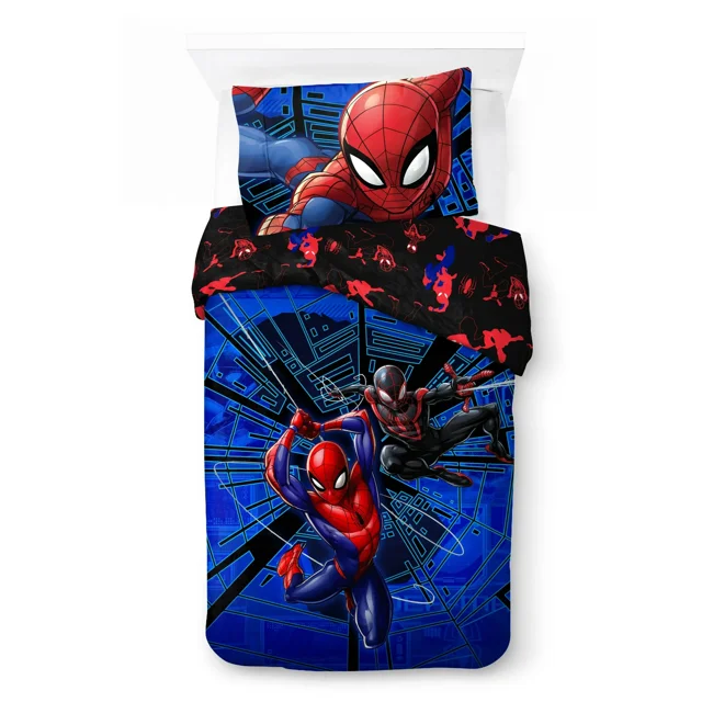 Spider-Man Kids 2-Piece Twin/Full Reversible Comforter and Pillowcase Set featuring two Spider-Man characters swinging on a blue techno city background on the front, reversible to a black side with red and blue Spider-Man silhouettes, including a pillowcase with a close-up of Spider-Man's face, made of soft polyester and sized 72 by 86 inches for twin or full beds.