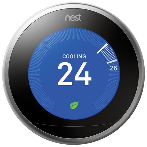 Google Nest Wi-Fi Smart Learning Thermostat (3rd Generation) in stainless steel with a circular design. The display shows a blue cooling mode interface set to 24°C, with a green leaf icon indicating energy efficiency. The thermostat features a sharp 2.08-inch LCD display with Farsight technology that lights up when approached. Compatible with various smart home devices and controllable via Wi-Fi and mobile apps.