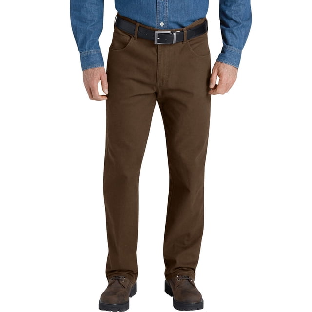 Genuine Dickies Men's Flex Duck Dungaree cargo pants in brown, front view on a model wearing a blue denim shirt and black belt, featuring a regular straight leg fit sitting slightly below the waist, made from 9.8 oz. twill with 98% cotton ripstop and 2% spandex for flexibility, including a multi-use cargo pocket on the right leg for added utility.