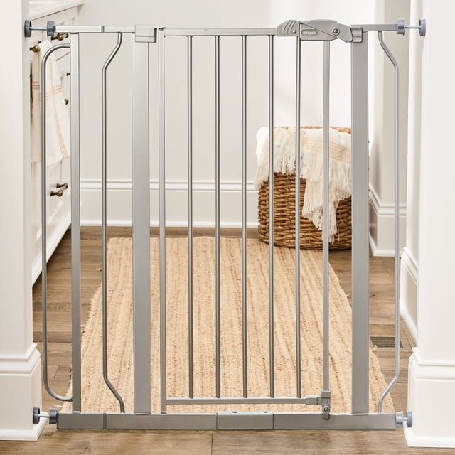 Regalo Easy Step 36" Extra Tall Metal Baby Safety Gate, Fits Openings 29-36.5 Inches, Platinum. Centered front view of 36" tall all-metal gate with vertical bars, rubberized pressure-mount knobs, included 4" extension and 16" walk-through door with one-touch lever lock.