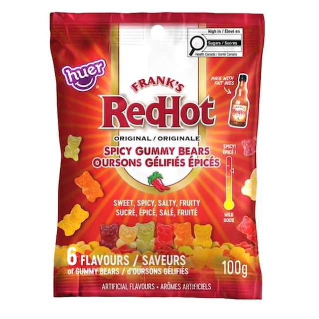 Huer Frank's Red Hot Oursons Gélifiés Épicés 100 g dans un Emballage Rouge Audacieux Présentant le logo RedHot de Frank et des illustrations Colorées d'Oursons Gélifiés. l'Emballage Met l'Accent sur six Saveurs Fruitées : Cerise, Ananas, Mangue, Fraise, orange et Citron, avec un Profil unique Sucré, Épicé, Salé et Fruité. Fait avec la sauce Piquante real Frank's.