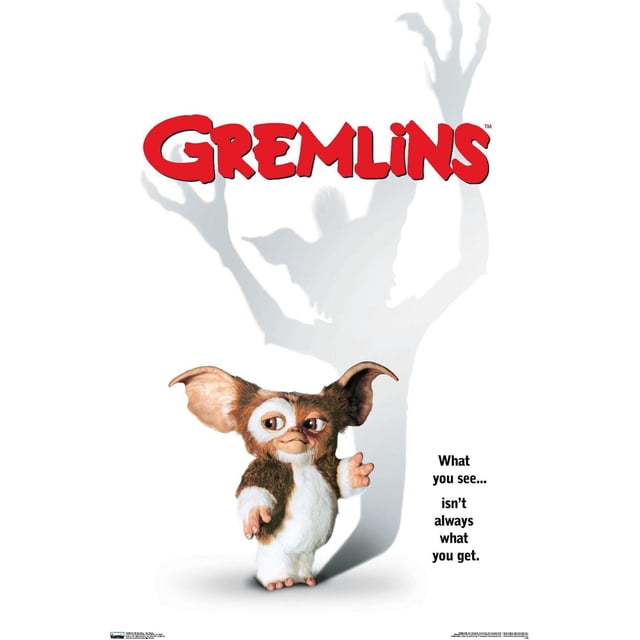 Gremlins - One Sheet Wall Poster, 22.375" x 34" showing Gizmo, a small brown and white furry creature with large ears, standing centered against a white background with a large shadow of a sinister gremlin behind, red Gremlins logo above, and the phrase 'What you see... isn't always what you get.' suitable for home décor and wall art.