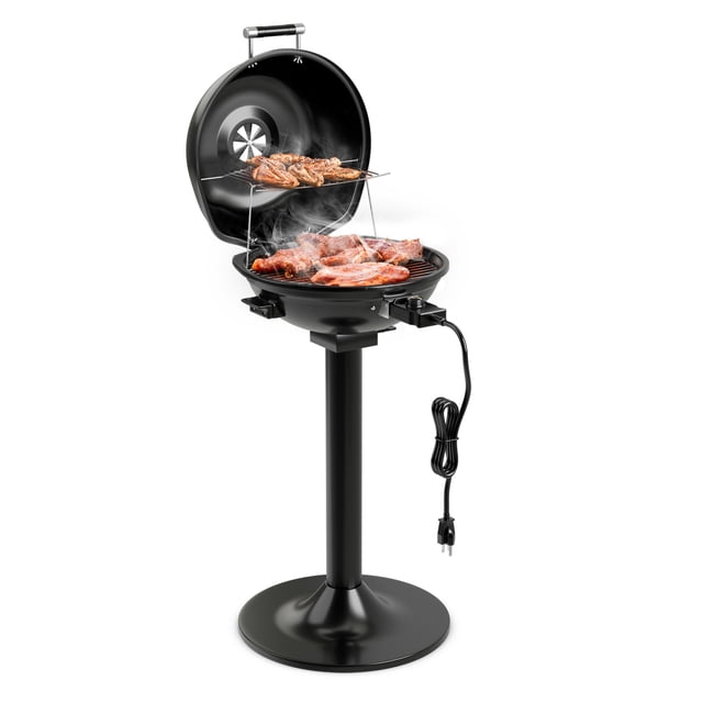 Patiojoy Electric BBQ Grill Portable Standing Grill in black with a removable non-stick warming rack and adjustable temperature control. This 1600-watt electric BBQ features a large grilling rack and an upper warming rack for heat preservation. Suitable for indoor and outdoor use, it has a sturdy pedestal base, interlocking hood, and adjustable air vent for juicy results. Includes a 3.6 ft cord and temperature range from 200℉ to 425℉.