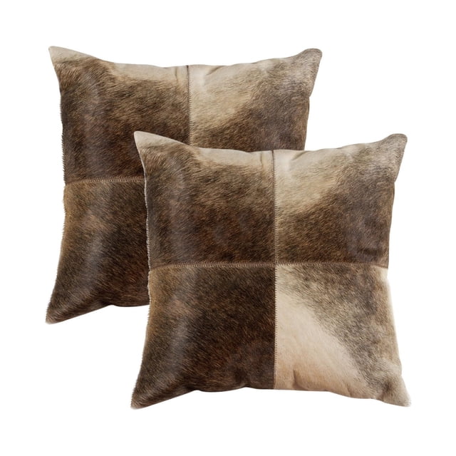 TORINO QUATTRO COWHIDE PILLOW 18"X18" 2-PACK with two hand-stitched square pillows made from 100% natural Indian cowhide in brown and beige patchwork, featuring hidden zipper closures and soft microsuede backing, ideal for layering in home décor and often used as floor cushions for added comfort.