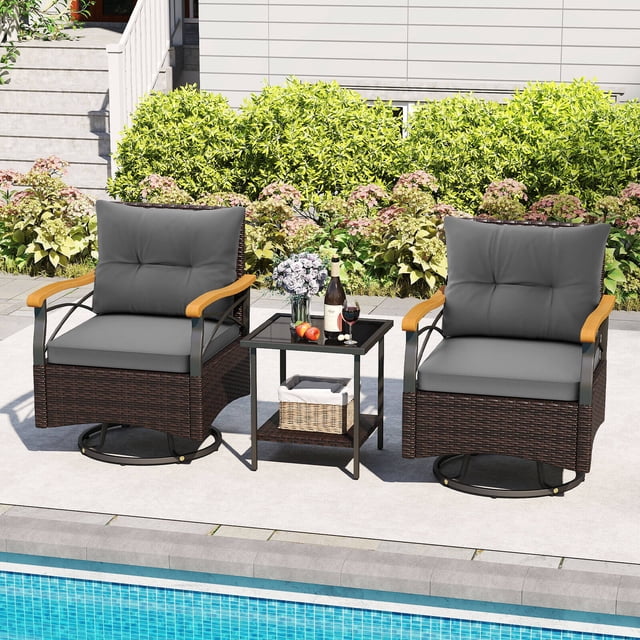 Costway 3 PCS Outdoor Swivel Chair Set with 2-Tier Tempered Glass Side Table Cushions. This set features two mix brown PE rattan swivel chairs with gray cushions, ergonomic backrests, and curved acacia wood armrests, each supporting up to 400 lbs. The 2-tier side table includes a tempered glass top and a rattan shelf for storage. Perfect for patios, gardens, or poolside settings, the set is shown in a serene outdoor environment with a garden backdrop.