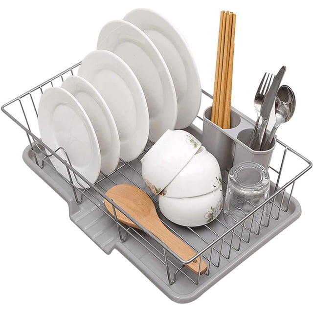 Dish Drying Rack, 304 Stainless Steel Dish Rack with utensil holder, cutting board holder, and dish drainer. The rack is grey with a compact design measuring 18.9 x 11.8 x 4.3 inches. It features slots for plates, bowls, and cups, along with a detachable utensil holder with two compartments for organizing spoons, knives, and chopsticks. The set includes a drainboard for kitchen countertop use, made from BPA-free materials and rust-proof stainless steel.