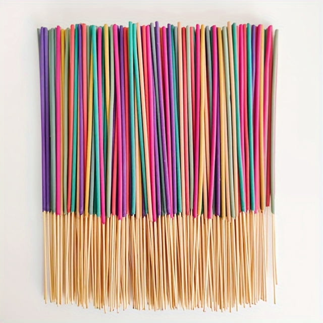 WIFKLSIIPG 140 Sticks Home Fragrance Incense Diffuser Various Scents for Odor Elimination. A set of 140 incense sticks in vibrant colors such as purple, pink, green, and yellow, with wooden bases. These natural incense sticks are infused with long-lasting fragrances like jasmine and sandalwood, perfect for relaxation, meditation, or neutralizing odors. Packaged elegantly for gifting or personal use.