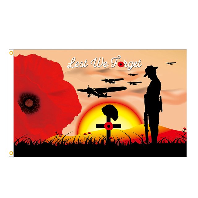Oubit House Outdoor Flag, 90 x 150cm Remembrance Single Layer Polyester Banner featuring a vivid design with a large red poppy, a silhouette of a soldier, a cross with a helmet, and a sunset background. The text 'Lest We Forget' is displayed prominently. Made of durable polyester with double-stitched edges, reinforced canvas head, and two brass grommets. Suitable for indoor and outdoor use, ideal for commemorating fallen soldiers and heroes.