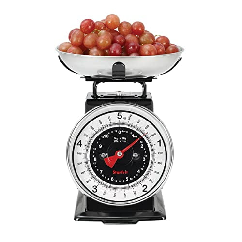 Starfrit Retro Mechanical Kitchen Scale with black base and removable stainless steel bowl holding red grapes, large 6.5-inch dial displaying measurements up to 11 lb / 5 kg, designed for precise cooking and baking measurements.