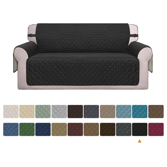 Reversible sofa cover by Visaccy in a quilted black design, shown on a light-coloured couch. Features elastic straps for a secure fit, water-resistant fabric, and furniture protector functionality. Includes 14 colour options displayed below the image.