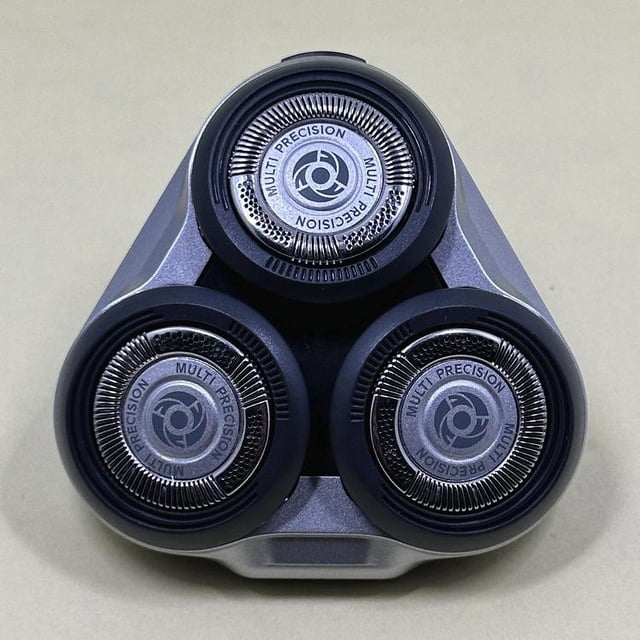 Philips Series 5000 Electric Shaver Replacement Head with three circular MultiPrecision blades for smooth and precise shaving. Compatible with multiple Series 5000 models, this washable replacement head ensures hygiene and easy maintenance, ideal for electric shaver upkeep.