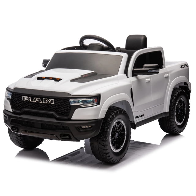 VOLTZ TOYS Licensed RAM 24V Ride-On Truck for Kids Ages 3+, a realistic white electric vehicle designed for outdoor play. Features LED headlights, taillights, black wheels, dual speed settings, MP3 music player, parental remote control, and cargo storage. Powered by a 24V battery with suspension for smooth rides.