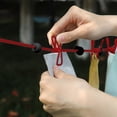 thumbnail image 4 of Retractable Travel Clothesline with 12 Clips, Windproof Elastic Rope, 70.87in Length, Stainless Steel Hooks for Indoor/Outdoor Drying, Camping, Portable Laundry Solution, 4 of 6
