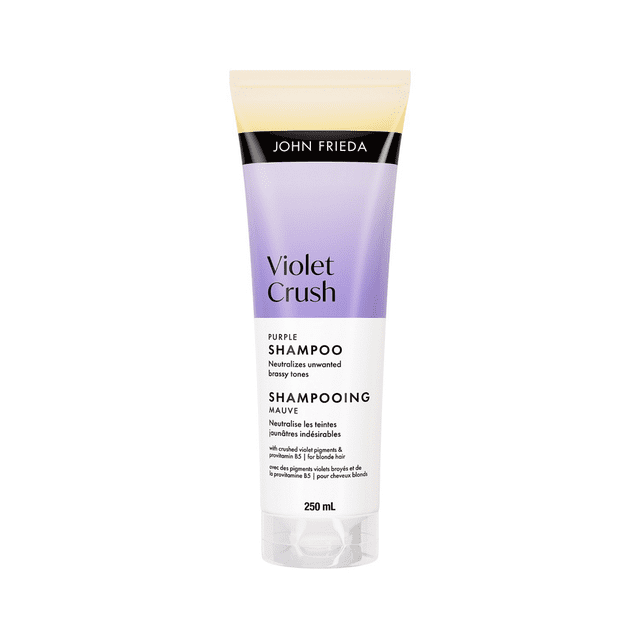 John Frieda Violet Crush Shampoing Violet pour la Réparation en Laiton des Cheveux Blonds Naturels et Traités par la Couleur en tube de 250 ml avec Étiquette Dégradée Violette et Bande Supérieure Noire, Formulé avec des pigments Violet Broyé pour Neutraliser les Tons Cuivrés et Hydrater les Cheveux Blonds au Quotidien.