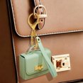 thumbnail image 1 of Stylish Leather Key Chain Pouch Handle Strap Coin Purse Bag Pendant Earphone Case Red Envelope, 1 of 5