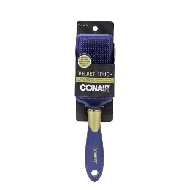 Conair Velvet Touch Detangle Brush with a purple paddle head featuring multi-height bristles and a soft-touch purple handle with gold accent, designed to gently detangle and distribute treatments for textured hair, suitable for wet or dry use.