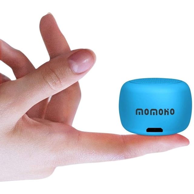 The Smallest Mini Bluetooth Speaker - BTS0011 Wireless Small Bluetooth Speaker, shown in vibrant blue, resting on a fingertip to highlight its compact, coin-sized design. This portable speaker delivers powerful sound, 2-hour battery life, and multifunctional button for music, calls, and selfies.