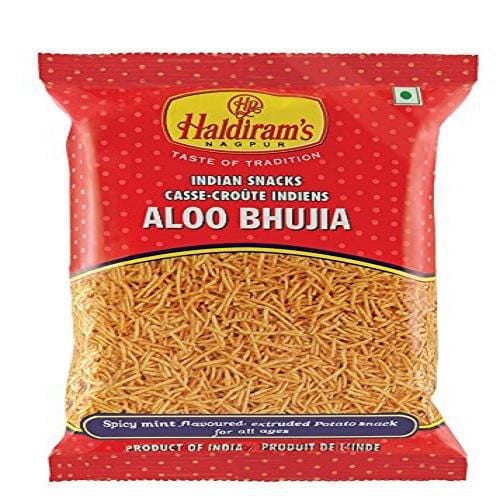 Haldiram Alu Bhujia 150 G in a red sealed bag containing thin, crispy extruded potato noodles seasoned with spicy mint, a popular Indian namkeen savory snack and product of India.