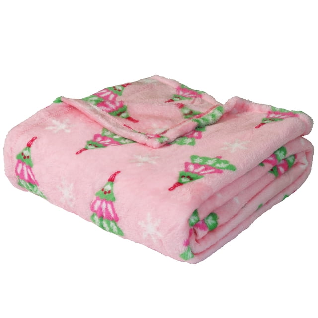 Holiday Time Soft Plush Throw blanket folded, featuring pink plush polyester fabric with green and red Christmas tree and white snowflake patterns, sized 50 by 60 inches, ideal for cozy warmth and seasonal home bedding decor.