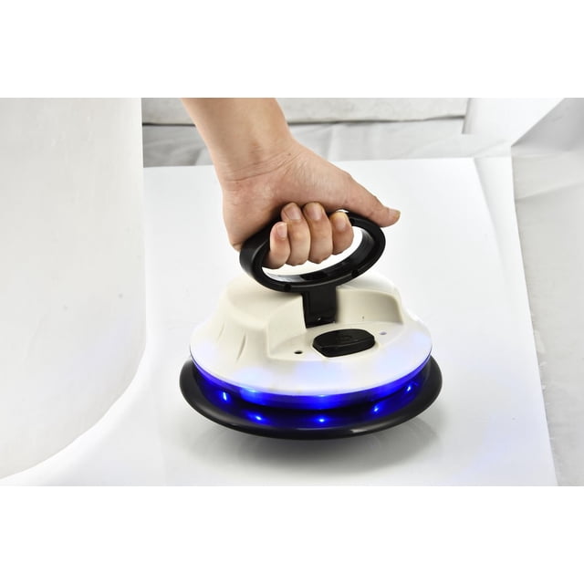 Ewbank CDB800 MAGIC cordless duster and buffer held by a hand gripping its black ergonomic handle, with a white body and black base featuring blue LED lights, ideal for dusting and buffing floors, tables, and car surfaces in auto detailing.