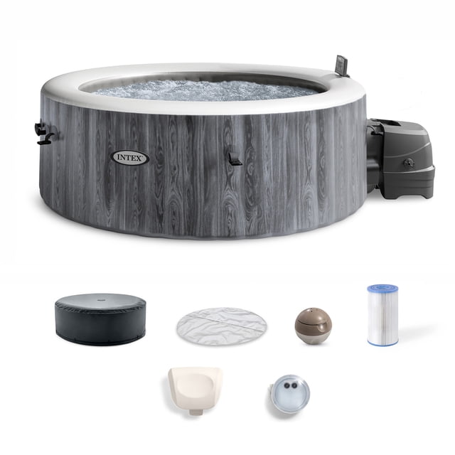 Intex PureSpa Greywood Deluxe Spa Set, a 77-inch by 28-inch round inflatable hot tub with a grey wood-like design. Features 140 bubble jets, a hard water treatment system, and a Positive Temperature Coefficient heater for efficient heating and safety. Includes a thermal-resistant foam cover, filter cartridge, headrest, and maintenance tools for energy-efficient spa use.