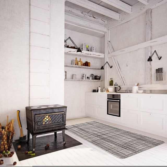 ECARPET Kitchen, Hallway, Laundry Room, Entrance, Kids Room, Bathroom Mat & Utility Rug in grey with geometric pattern on white wooden floor in a rustic kitchen featuring white cabinetry, built-in oven, open shelves with kitchenware, and a black wood-burning stove on a black hearth mat, ideal for high-traffic indoor spaces.