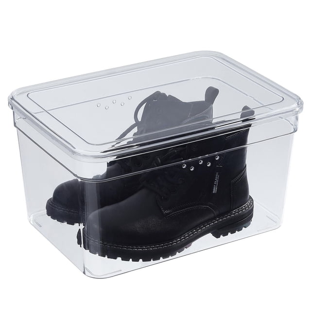 Mainstays Shoe Box - Extra Tall clear plastic storage box with lid, showing black boots inside. Features vent holes for breathability, stackable design, and measures 10.5in W x 14.75in D x 8.25in H. Suitable for wide and tall shoes up to men's size 13 and women's size 14, also ideal as a multi-functional organizer bin.