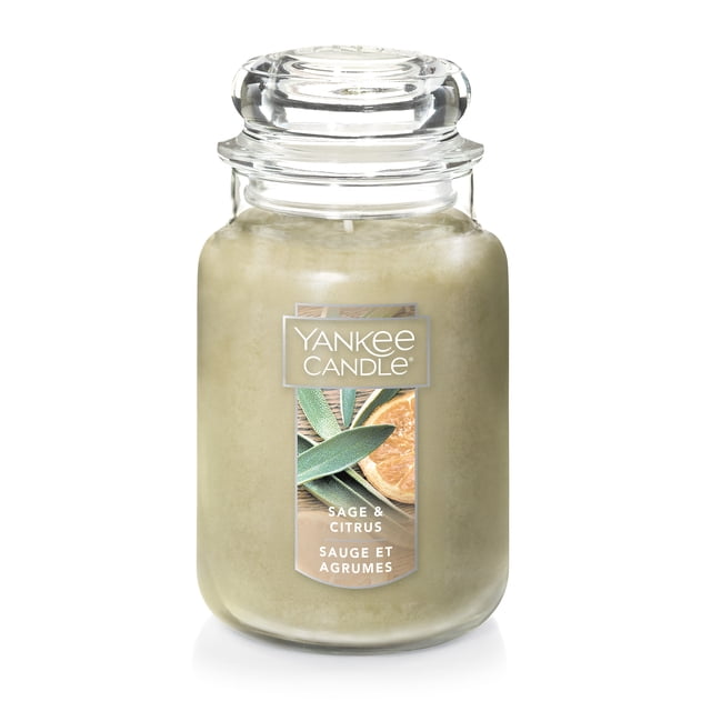 Yankee Candle Scented Candle, Sage & Citrus, 22 oz Original Large Jar with clear glass jar and lid, light green wax, and a label showing sage leaves and citrus slices, suitable for home décor and providing long-lasting fragrance.