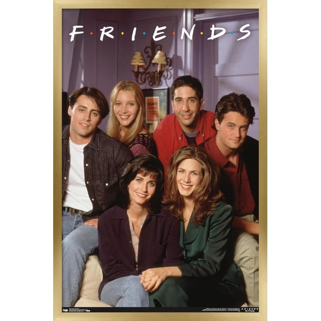 Friends - Apartment Wall Poster, 22.375" x 34" framed poster featuring the six main characters from the TV show Friends seated together in a purple-walled apartment living room with a vintage wall sconce and framed artwork behind them, showcasing classic 90s fashion styles and suitable for decorating bedrooms, offices, or dorm rooms.