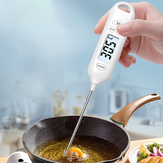 Uscallm Food Thermometer Digital Water Temperature Gauge with a white plastic body and stainless steel probe, shown measuring oil temperature in a frying pan. Features a backlit LCD display with clear temperature readings and buttons for HOLD and mode selection. Suitable for kitchen tasks like cooking, baking, candy making, and as an instant read meat thermometer.