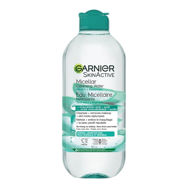 Garnier Micellar Water Makeup Remover All-In-One Cleanser with Hyaluronic Acid and Aloe in a clear 400 ml bottle with teal flip-top cap, formulated for normal and sensitive skin to gently cleanse, remove makeup, and replump skin without rinsing or rubbing.