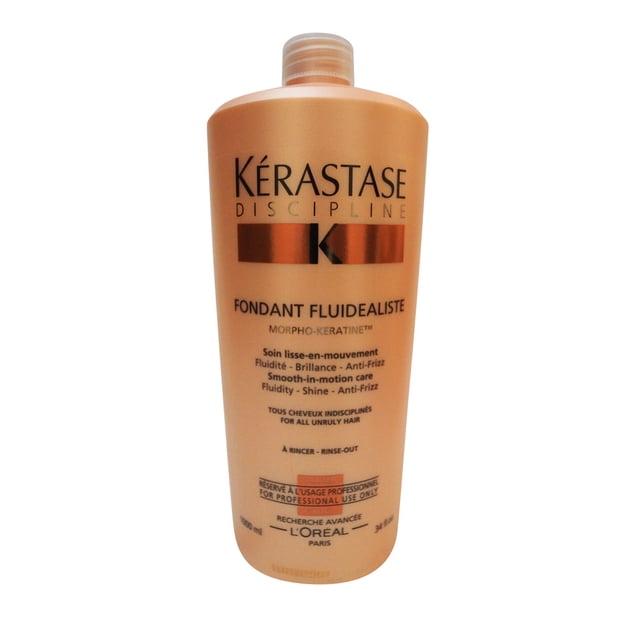 Kérastase Discipline Revitalisant de Soin Fondant Fluide en Mouvement Fluide, Bouteille de 34 oz. l'Après-shampoing Est Conçu pour les Cheveux Longs, Améliorant le Mouvement des Liquides, la Brillance et une Hydratation Légère. la Bouteille Présente un design Multicolore avec le logo Kérastase et les Détails du Produit Bien en Vedette.