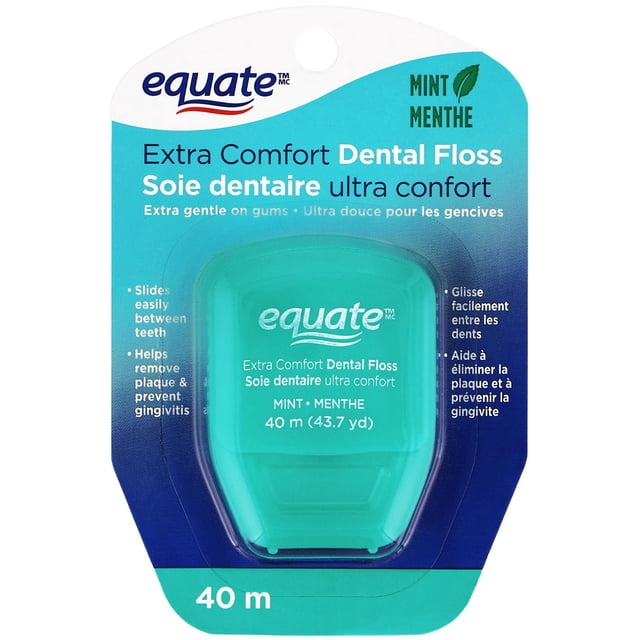 Equate Extra Comfort Menthe Fil Dentaire dans un Étui en Plastique turquoise avec 40 Mètres (43,7 yards) de Fil Ciré, Tissé. Il Est Doux pour les Gencives, Aide à Enlever la plaque, Prévient la Gingivite et Rafraîchit l'Haleine avec une Saveur de Menthe. l'Emballage Présente un Texte Bilingue Anglais et Français sur une Carte Bleue et Sarcelle.