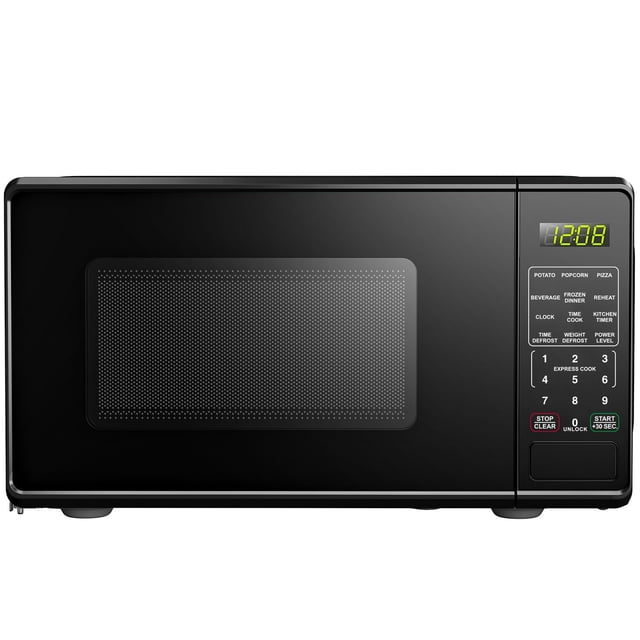 Mainstays 0.7 Cu ft compact countertop microwave oven in black with a front-facing rectangular door featuring a dark mesh window, LED clock display showing 12:08, and a control panel with 6 quick-set menu buttons, numeric keypad, start/stop buttons, and 10 power levels, suitable for small kitchens or dorm rooms.