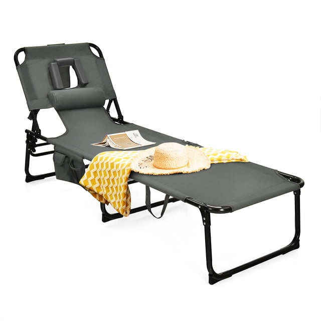 Topbuy Beach Lounge Chair with 5 adjustable positions, detachable pillow, and hand ropes in gray. This foldable outdoor chair is made of durable oxford fabric and a heavy-duty steel frame, supporting up to 330 lbs. It features a face hole and arm slots for reading or phone use while lying face down, and folds easily for storage and transport. Ideal for use at the beach, poolside, or grassland.