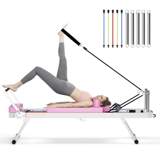 Soges Foldable Pilates Reformer Machine for Home Use in pink, designed for portability with a foldable frame and small wheels for easy storage. It features springs and colorful elastic cords for adjustable resistance, catering to all fitness levels. The machine includes high-density shoulder pads, head and neck pillows, padded foot bars, and a textured standing platform for enhanced comfort and stability. A woman is depicted using the machine for a leg exercise, showcasing its functionality. Dimensions are 77.9 inches long, 21.6 inches wide, and 28.7 inches high, supporting up to 330 lbs.