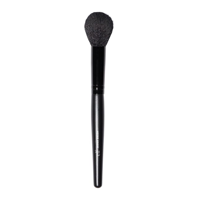 e.l.f. Cosmetics Blush Brush with black synthetic Taklon bristles and tapered handle, antibacterial and designed for precise application of blush or bronzer on wet or dry makeup, suitable for creating a defined, sculpted look.