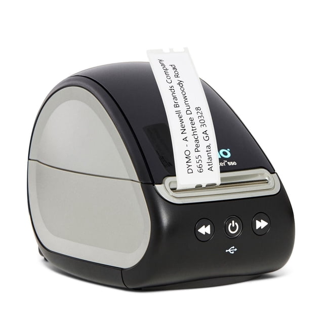 DYMO LabelWriter 550 Imprimante d'Étiquettes avec un Corps Courbé Noir et Gris Montré en Profil 3/4, Dotée de Trois Boutons de Commande avant et d'Une Impression d'Étiquettes d'Adresse Blanches à Partir de l'Embouchure. Cette Imprimante Thermique Directe Offre une Reconnaissance Automatique des Étiquettes et Imprime jusqu'à 62 Étiquettes par minute Sans Encre Ni toner, Idéale pour une Impression Précise des Étiquettes de Bureau et pour Réduire le Gaspillage de Feuilles d'Étiquettes.