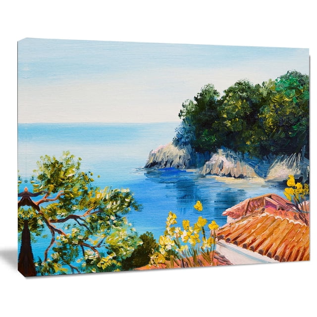 Design Art House near The Sea Canvas Print featuring a gallery wrapped cotton canvas with a coastal landscape of blue sea, rocky cliffs, lush green trees, yellow flowering plants, and terracotta roof tiles, ready to hang wall art for home décor, suitable for adding a vibrant coastal vibe to living or office spaces.