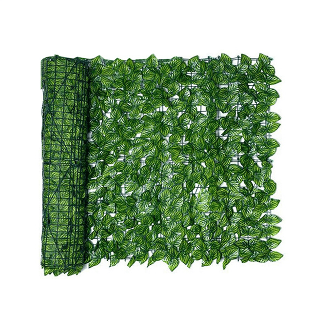 Artificial Leaf Privacy Fence Roll Wall Landscaping Fence Privacy Fence Screen for outdoor use. The fence features a grid backing with dense, realistic green plastic leaves designed to block sunlight while allowing air circulation. Measuring 50x100x3cm, it is flexible, easy to install, and maintain. Ideal for gardens, backyards, balconies, and other outdoor spaces to enhance privacy and reduce noise.
