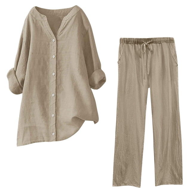 Timegard Womens 2 Piece Plus Size Lounge Set in a solid neutral color, featuring a long sleeve notched V-neck button-down top and drawstring pants. Made of 95% polyester and 5% spandex for a lightweight and soft feel, perfect for lounging or casual wear. The top has white buttons, rolled sleeves, and a relaxed fit, while the pants include an elastic waistband with drawstring and side pockets. Ideal for pairing with accessories like necklaces, casual footwear, or layering for fall and winter fashion.